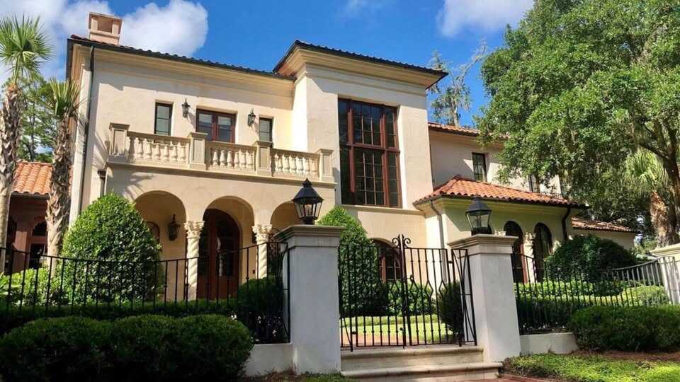 Mediterranean stucco home repainted with contrasting trim