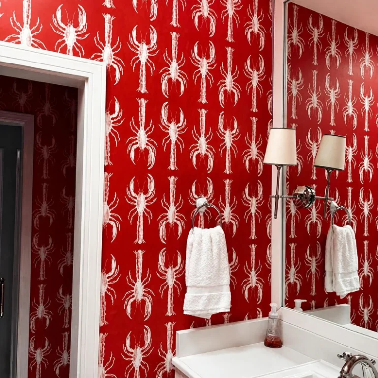 Red lobster-pattern wallpaper installed in a bathroom