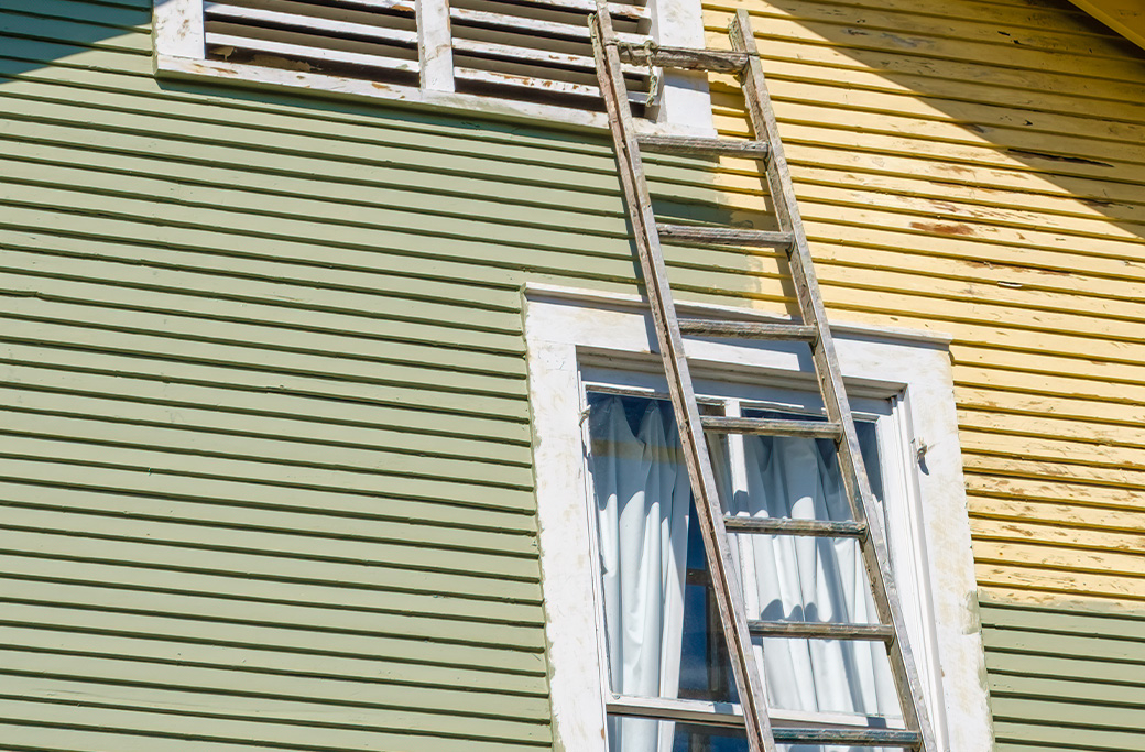 Salt and weather buildup on painted exterior trim in the Golden Isles