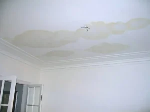 Water stain on a ceiling after a roof leak