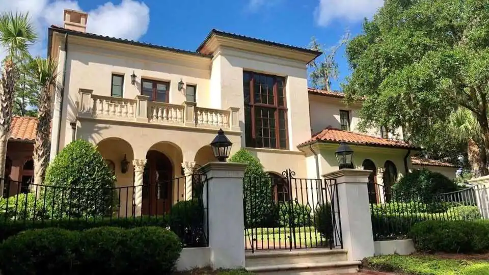 Mediterranean stucco home repainted with contrasting trim